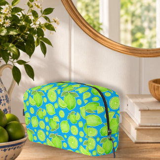 Trousse De Toilette Citrons verts colorés sur motif de citrus bleu