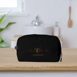 Trousse De Toilette Mme Newlysée en or noir