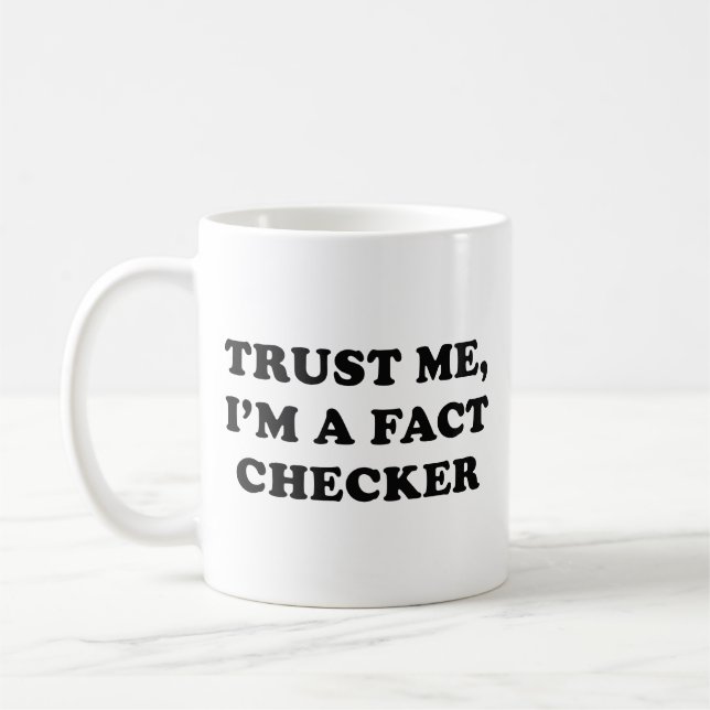 Trust Me, I’m A Fact Chequered Coffee Mug (Left)