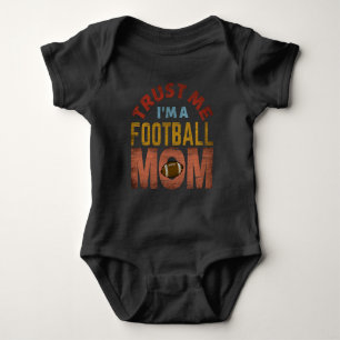 TRUST ME I'M A FOOTBALL MOM BABY BODYSUIT