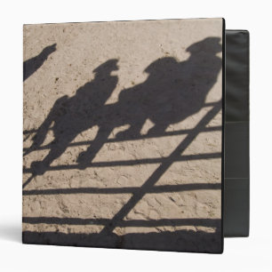 Tucson, Arizona: Shadows of Rodeo competitors Binder