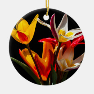 Tulip flowers against black background ceramic ornament