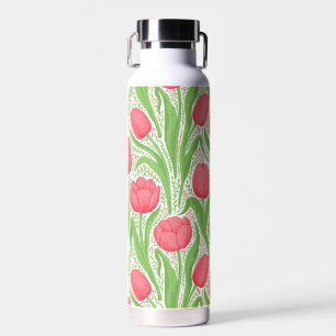 Tulips in red and green water bottle