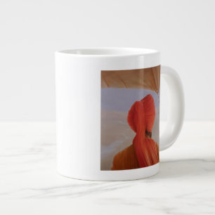 Turbaned backview with tenting large coffee mug