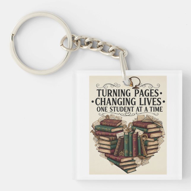 Turning Pages Changing Lives | Vintage Book Heart  Keychain (Front)