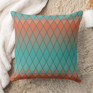Turquoise and orange diamond pattern throw pillow