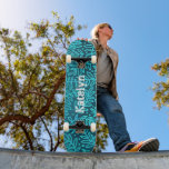 Turquoise blue leaf pattern custom name cool bold skateboard<br><div class="desc">Spread some flair on your city streets with this personalized, custom name skateboard. Modern, trendy, white distressed, edgy typography overlays a turquoise blue ombre leaf foliage damask pattern on a rich, deep teal textured background. Makes a cool and stylish statement every time you surf the pavement. A great gift for...</div>