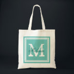 Turquoise blue monogram wedding party tote bags<br><div class="desc">Custom turquoise blue monogrammed wedding party tote bags. Personalized name monogram tote bag | Customizable colour background. Elegant logo design with letter initials and fancy border frame. Cute vintage gift idea for bride and brides entourage. Make your own for trendy bridesmaid, maid of honour, flower girls, mother of the bride,...</div>