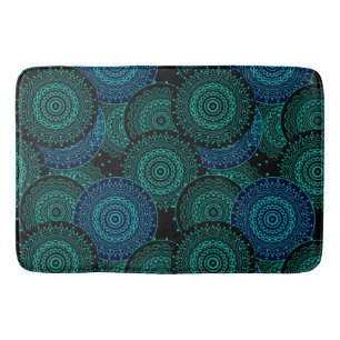 Turquoise blue round mandala on black background bath mat