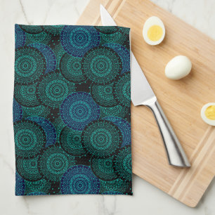 Turquoise blue round mandala on black background kitchen towel
