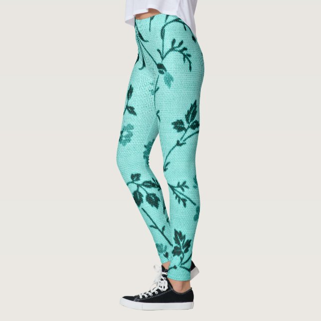 Turquoise floral pattern leggings (Left)