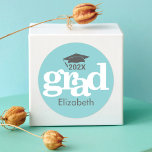 Turquoise Graduation Bold Typography Simple Modern Classic Round Sticker<br><div class="desc">Announce to the world that your favourite grad has reached their milestone with this stunning, simple, modern, personalized sticker. Bold, graphic, soft grey cap icon and typography overlay an aqua blue background. Personalize the custom text with your graduate’s name and class year. Choose from a round or square shape, in...</div>