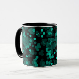 Turquoise green polka dot pattern on black mug
