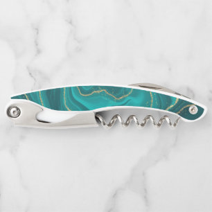 Turquoise liquid marble background with gold corkscrew