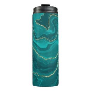 Turquoise liquid marble background with gold thermal tumbler
