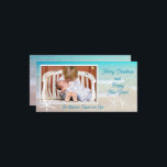 Turquoise Ocean Beach Christmas Photo Card<br><div class="desc">Tropical beach ocean family Christmas photo card.  White starfish and aquamarine water decorate long cards with a single photo template.  “Merry Christmas and Happy New Year” is the sample greeting with a place for a signature.</div>