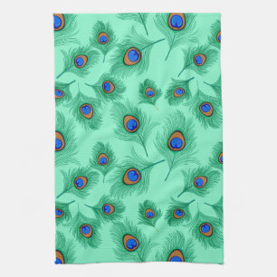 Turquoise Peacock Feathers on Light Aqua Kitchen Towel