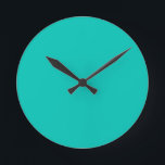 Turquoise Wall Clock<br><div class="desc">Turquoise solid color Wall Clock by Gerson Ramos.</div>
