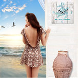 Turtle Beach House Wood Look Wall Clock<br><div class="desc">Stylish beach house style wall clock,  with graphics of a white washed distressed wood background and beautiful aqua blue graphics of a decorative sea turtle.  Bold aqua blue numbers denote 12,  3,  6,  and 9 o'clock.  Personalize the aqua blue text to suit your needs.  Makes a great gift idea.</div>
