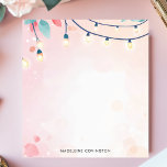 Twinkling String Lights Pastel Personalized Name Notepad<br><div class="desc">Add a touch of magic and warmth to your notes with this charming, personalized notepad. The design features delicate string lights draped across the top, creating a cozy and inviting atmosphere. The soft, pastel background enhances the twinkling effect. Customize this notepad with your own text. Perfect for evening notes, reminders,...</div>