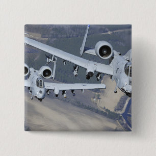 Two A-10C Thunderbolt II aircraft fly in format 2 Inch Square Button