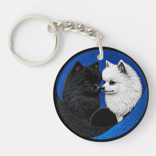 Two adorable spitz dogs keychain
