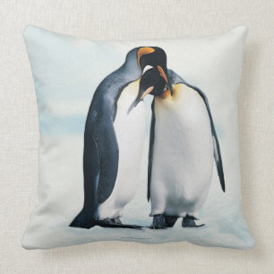 Two affectionate penguins throw pillow