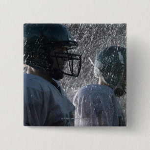 Two American football players in rain, side view 2 Inch Square Button