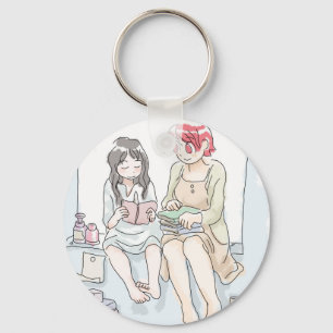 Two barefoot female illustrations sitting at the w keychain