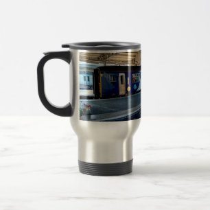 Two blue trains travel mug