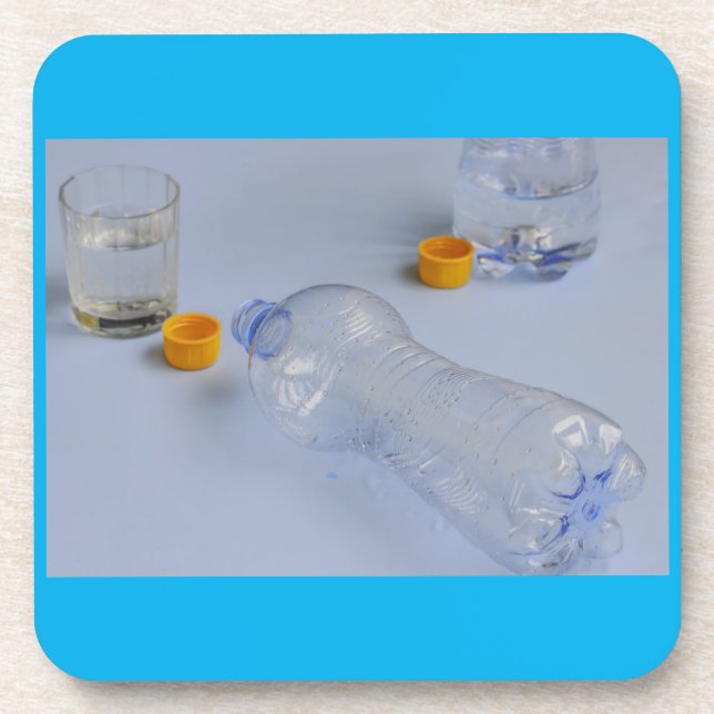 two bottles emptied on hard plastic coaster (Front)
