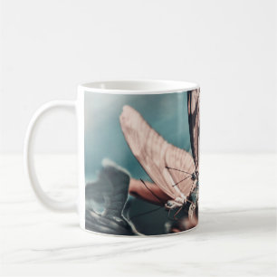 TWO BROWN-AND-BLACK BUTTERFLIES ON TOP OF FLOWER B COFFEE MUG