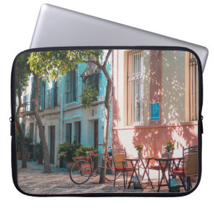 Two brown table outside laptop sleeve