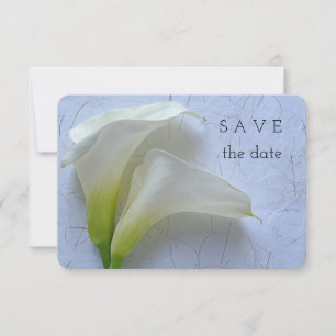 Two calla lilies on textured paper save the date