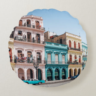 TWO CARS PARKED OUTSIDE BUILDING ROUND PILLOW