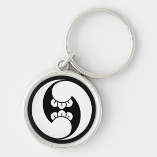 Two counterclockwise clove swirls keychain