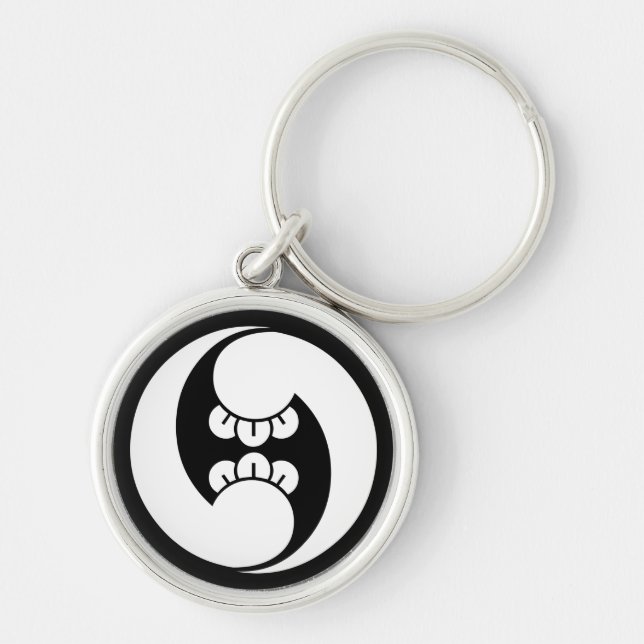 Two counterclockwise clove swirls keychain (Front)
