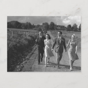 Two couples walking on country road B&W Postcard