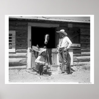 Two cowboys standing next to a barn with a horse poster