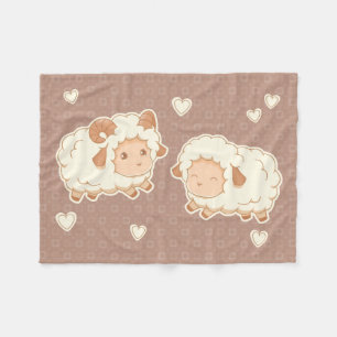 Two Cute Little Sheep on Brown Fleece Blanket