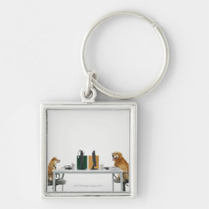 Two dogs wearing tie and glasses ,sitting on keychain