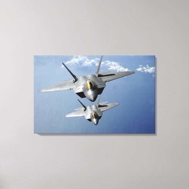Two F-22 Raptors fly over the Pacific Ocean 2 Canvas Print (Front)
