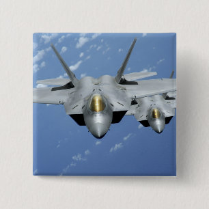 Two F-22 Raptors fly over the Pacific Ocean 2 Inch Square Button