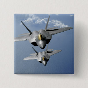 Two F-22 Raptors fly over the Pacific Ocean 2 Inch Square Button