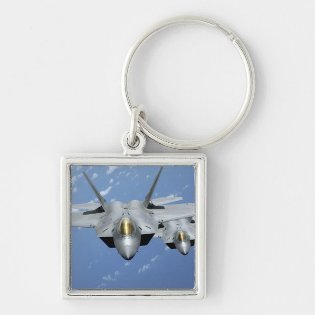 Two F-22 Raptors fly over the Pacific Ocean 2 Keychain (Front)