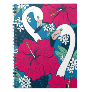 Two flamingos among hibiscus and plumeria flowers notebook
