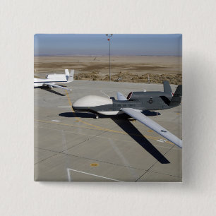 Two Global Hawks parked on a ramp 2 Inch Square Button