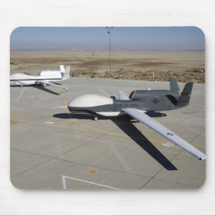 Two Global Hawks parked on a ramp Mouse Pad