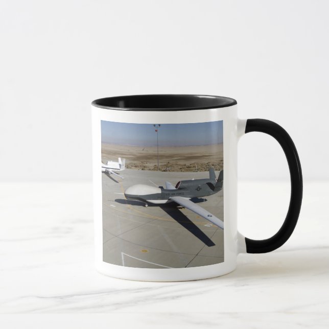 Two Global Hawks parked on a ramp Mug (Right)