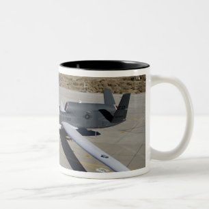 Two Global Hawks parked on a ramp Two-Tone Coffee Mug